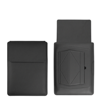 Black laptop sleeve with front flap and embossed stand panel, shown front and back