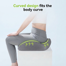 Gray curved memory foam seat cushion on chair for leg support