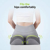 Gray memory foam seat cushion shaped for comfortable hip support